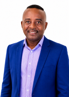 Dr. Clement Iyoha in blue blazer